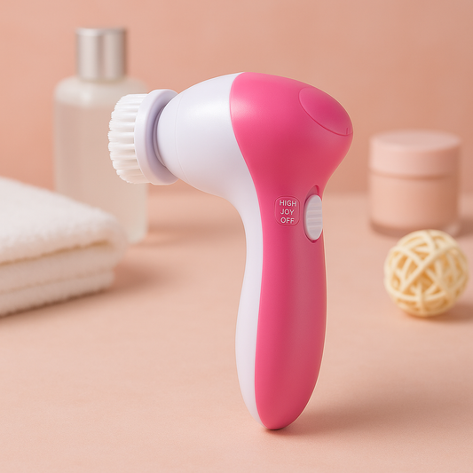 Pink and white facial cleansing brush on a pink background with skincare products.
